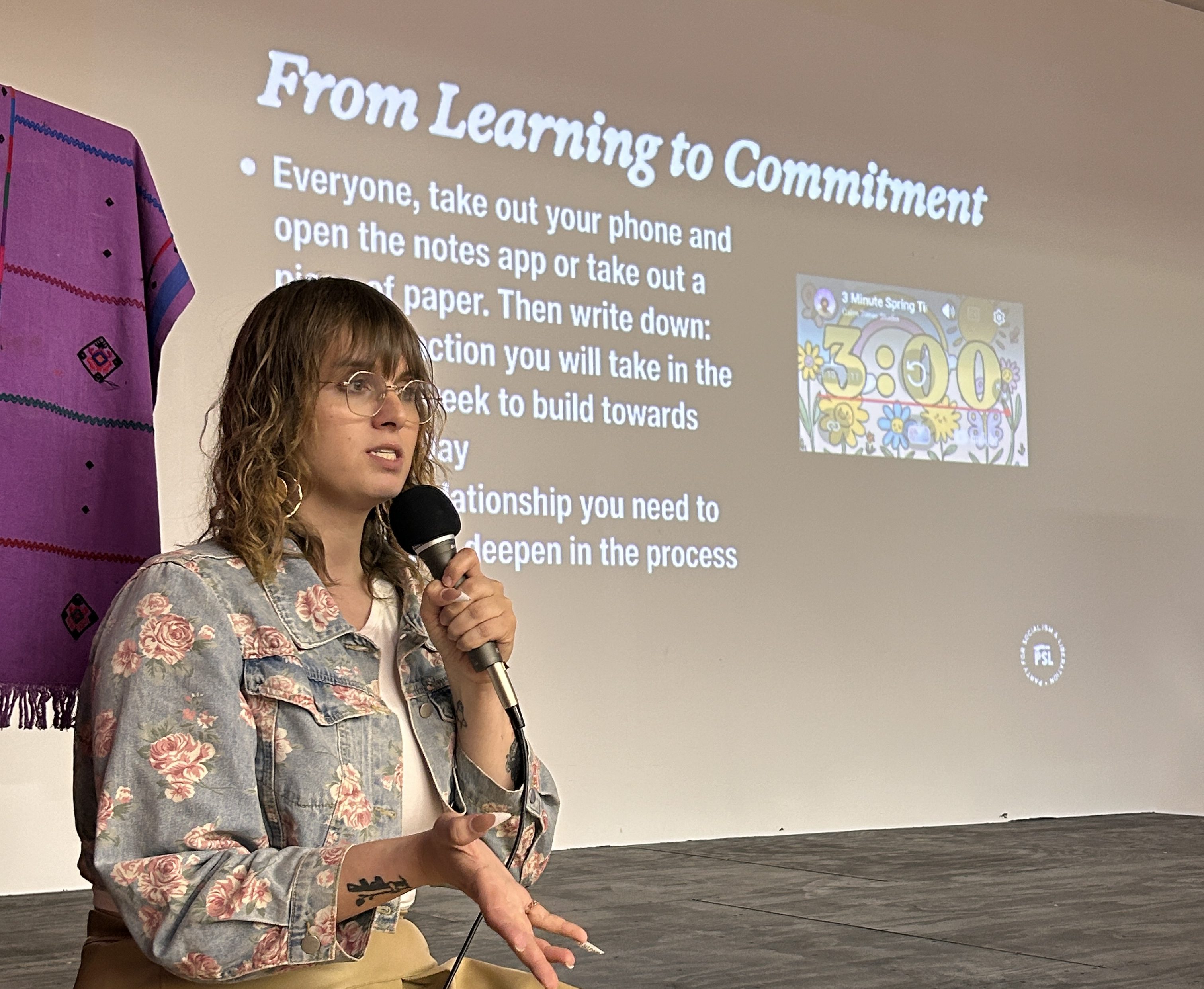 Alithia Zamantakis presenting.